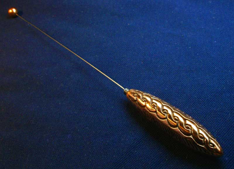 Einhandrute aus Kupfer mit keltischem Symbol